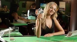 Mobile phone screen showing warung255 Playtech lobby with live table list and balance display